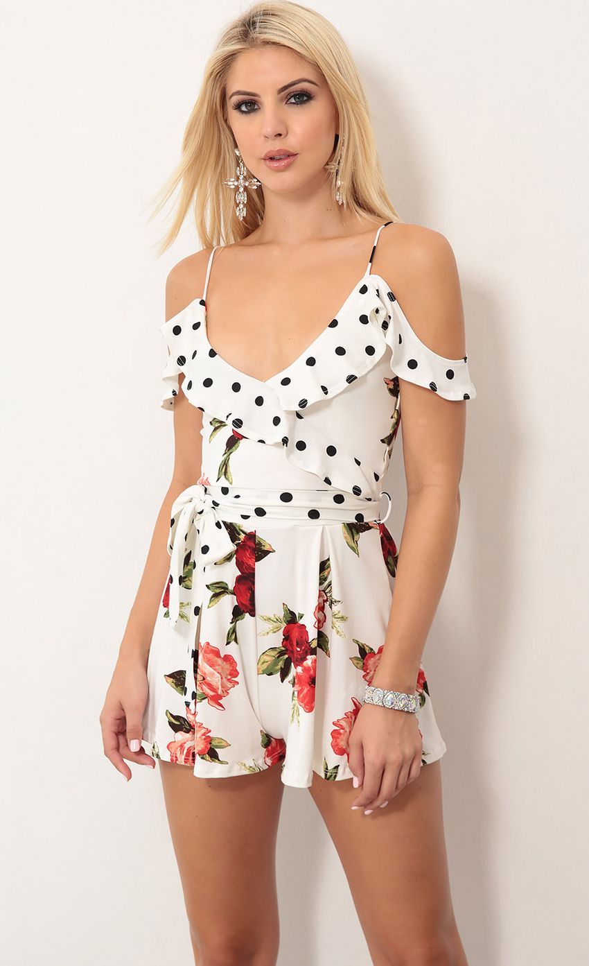 Picture Isabella Ruffle Romper In White Floral Polka Dot. Source: https://media-img.lucyinthesky.com/data/Aug18_2/850xAUTO/0Y5A3251.JPG