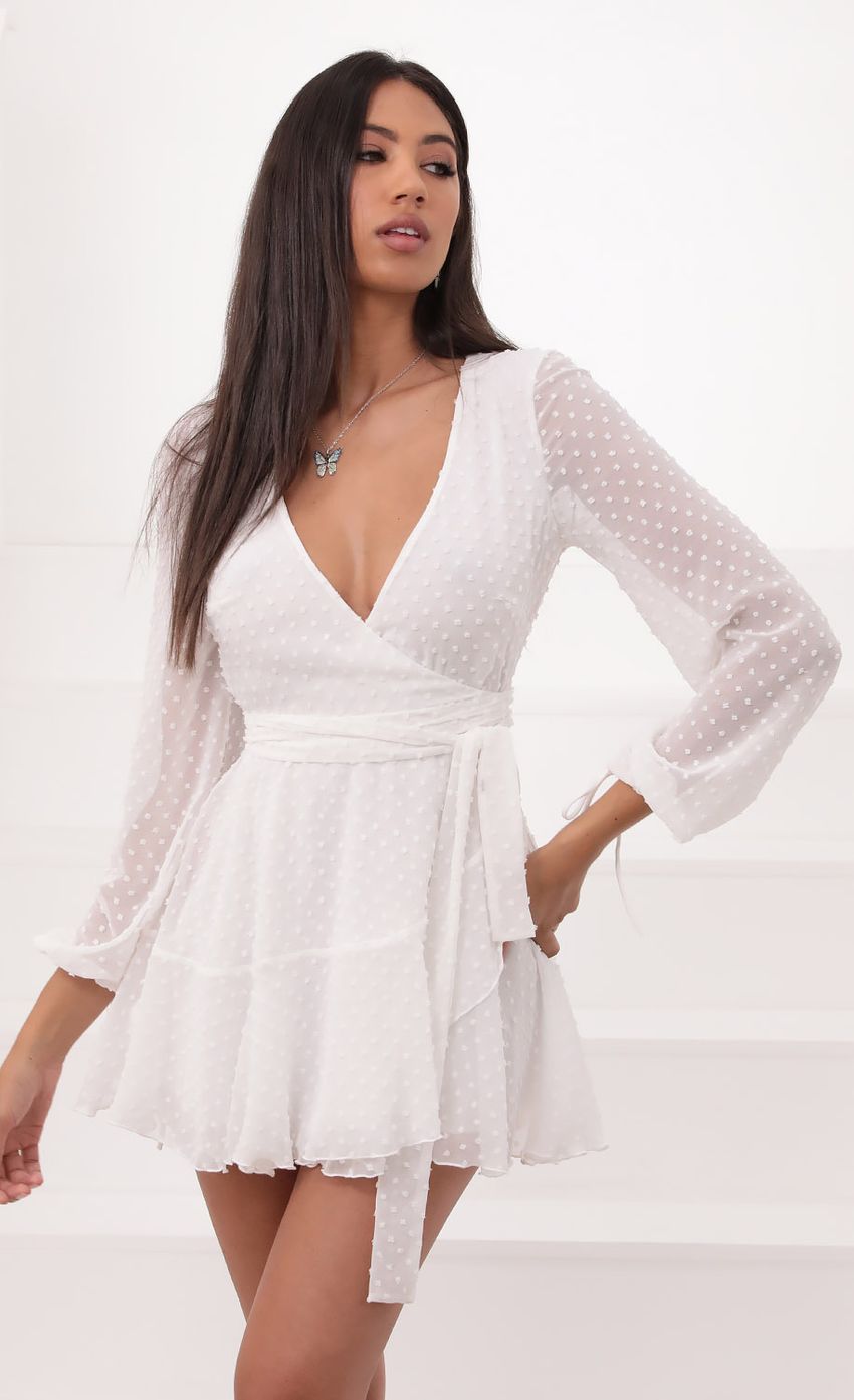 Picture Wrap Dress in Ivory Dotted Chiffon. Source: https://media-img.lucyinthesky.com/data/Aug20_1/850xAUTO/781A8341.JPG