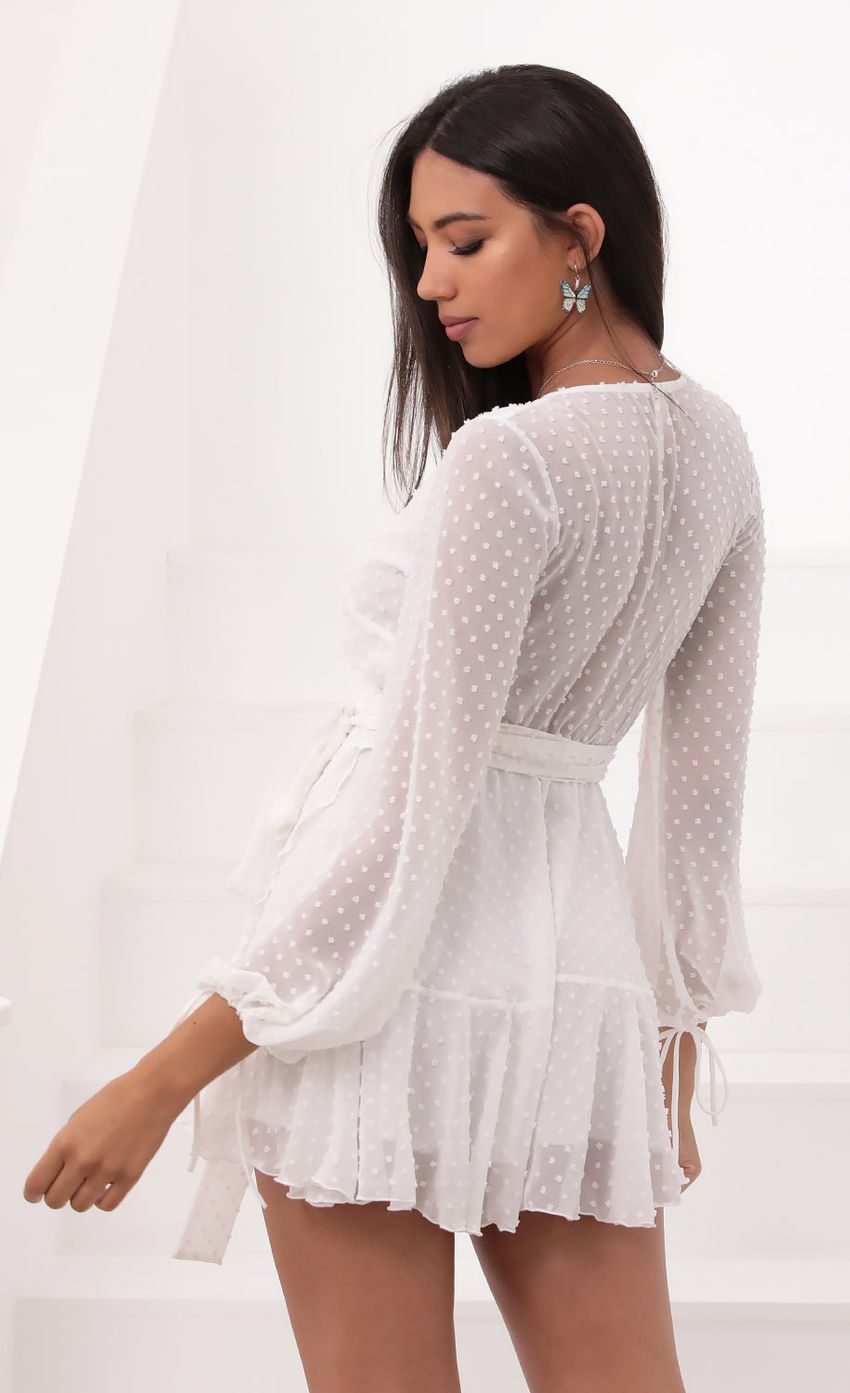 Picture Wrap Dress in Ivory Dotted Chiffon. Source: https://media-img.lucyinthesky.com/data/Aug20_1/850xAUTO/781A8412.JPG
