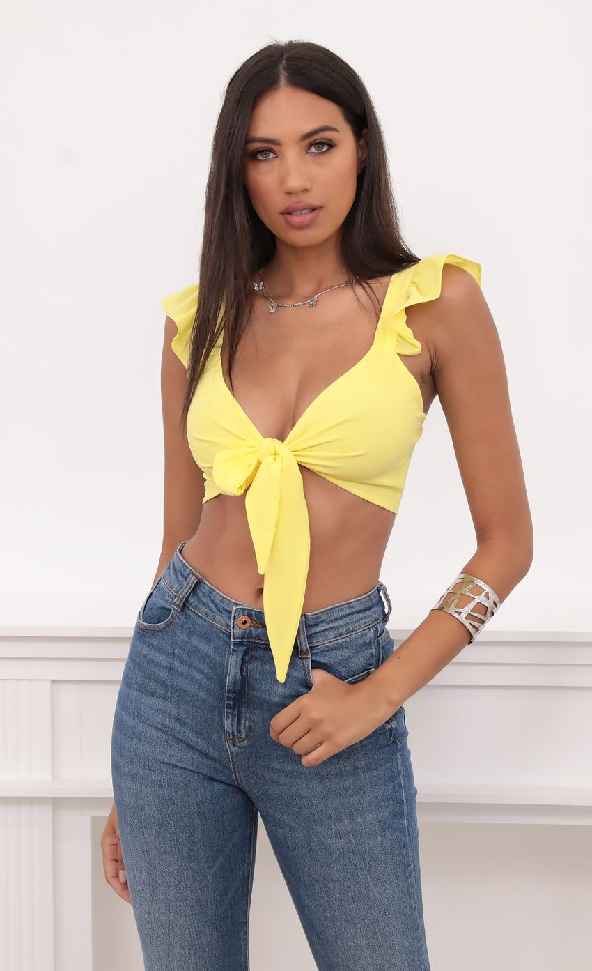 Picture Carolina Ruffle Tie Crop Top in Yellow. Source: https://media-img.lucyinthesky.com/data/Aug20_1/850xAUTO/781A9090.JPG