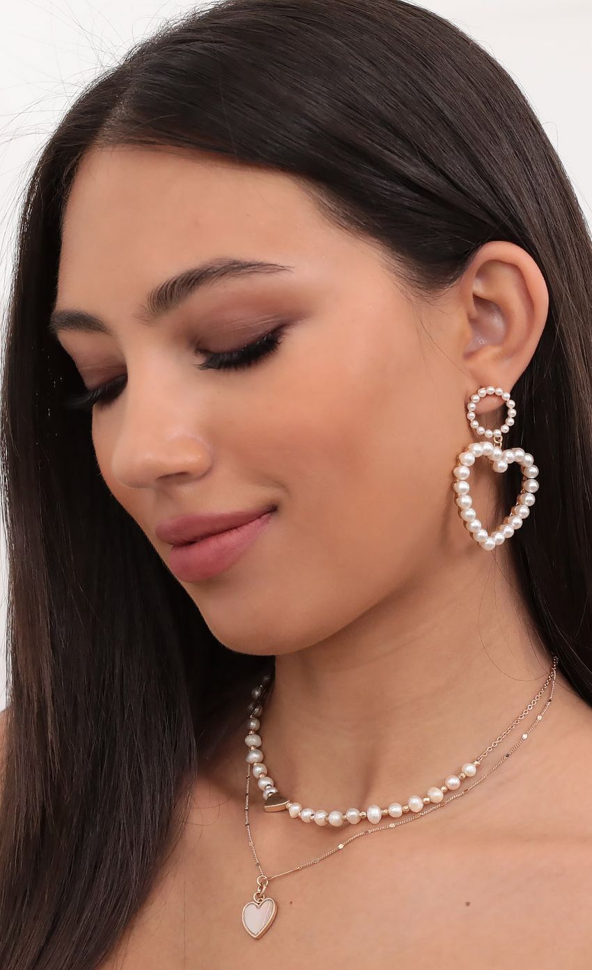 Picture Mi Amour Earrings in Pearl And Gold. Source: https://media-img.lucyinthesky.com/data/Aug20_2/850xAUTO/781A18371.JPG