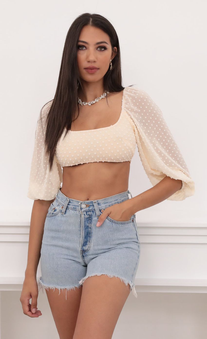 Picture Vanessa Corset Top in Ivory Chiffon Polka Dots. Source: https://media-img.lucyinthesky.com/data/Aug20_2/850xAUTO/781A2658.JPG