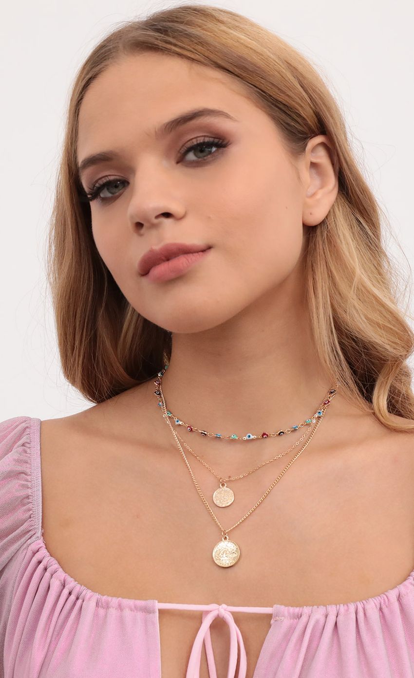 Picture All Eyes On Me Necklace In Gold. Source: https://media-img.lucyinthesky.com/data/Aug20_2/850xAUTO/781A5151.JPG