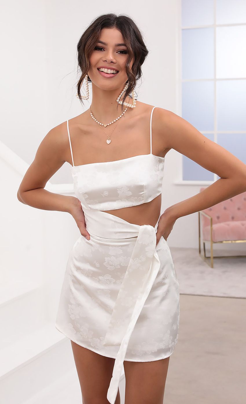 Picture Cutout Tie Dress in White Satin. Source: https://media-img.lucyinthesky.com/data/Aug20_2/850xAUTO/781A7121.JPG