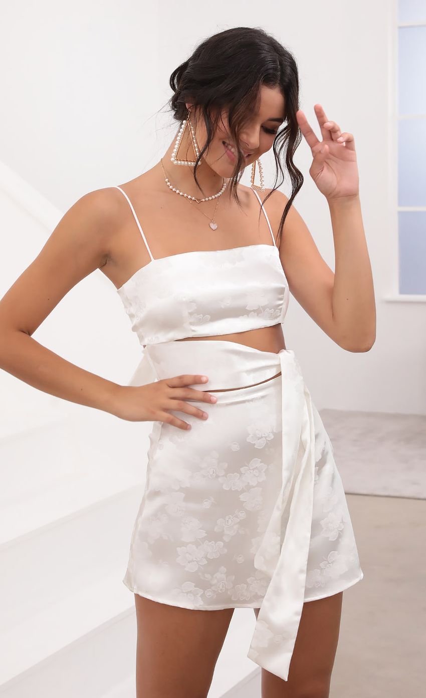 Picture Cutout Tie Dress in White Satin. Source: https://media-img.lucyinthesky.com/data/Aug20_2/850xAUTO/781A7146.JPG