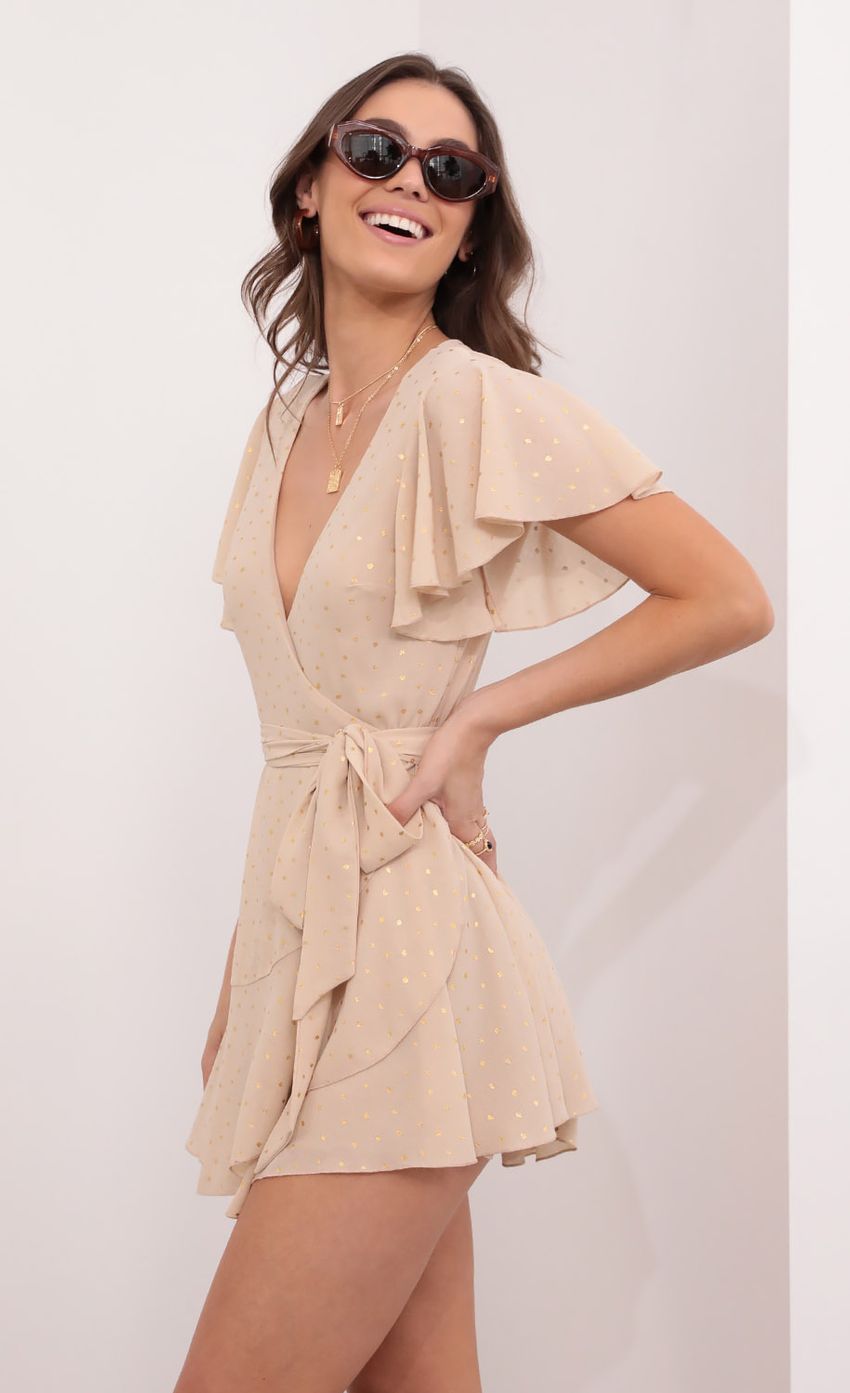 Picture Eliza Wrap Dress in Tan. Source: https://media-img.lucyinthesky.com/data/Aug21_1/850xAUTO/1V9A1111.JPG