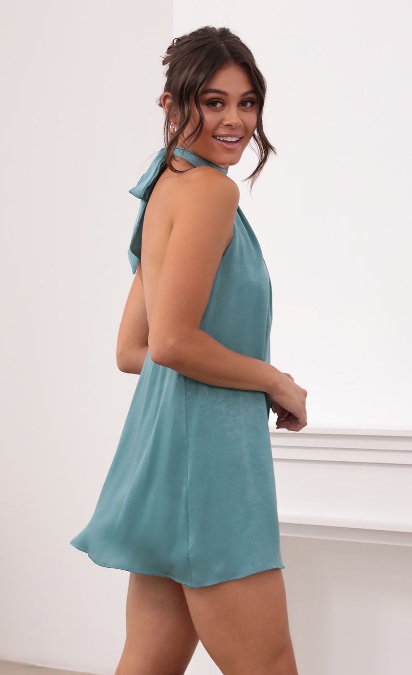 Picture Halter Dress in Turquoise. Source: https://media-img.lucyinthesky.com/data/Aug21_1/850xAUTO/1V9A3802.JPG