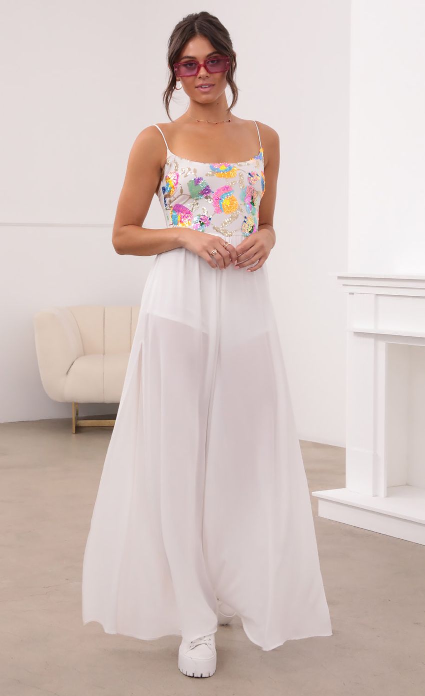 Picture Multicolor Sequin Jumpsuit in White. Source: https://media-img.lucyinthesky.com/data/Aug21_1/850xAUTO/1V9A6221.JPG
