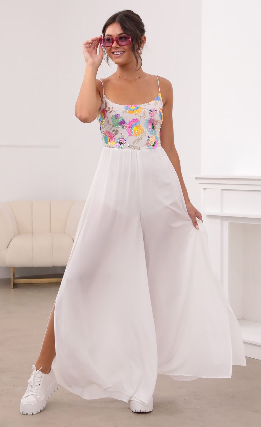 Picture Multicolor Sequin Jumpsuit in White. Source: https://media-img.lucyinthesky.com/data/Aug21_1/850xAUTO/1V9A6410.JPG