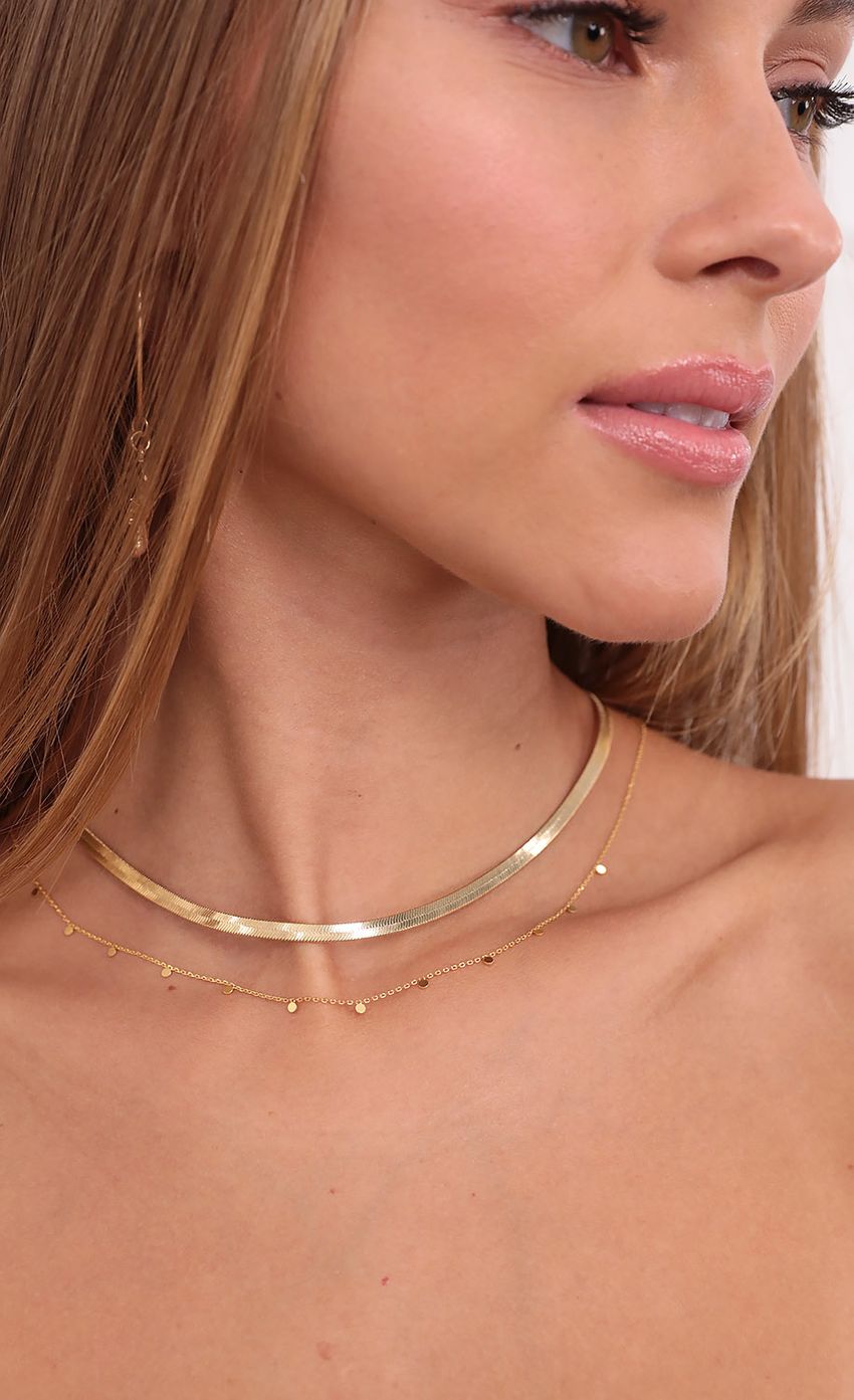 Picture Sweet Surprise Layered Necklace in Gold. Source: https://media-img.lucyinthesky.com/data/Aug21_2/850xAUTO/1V9A0153.JPG
