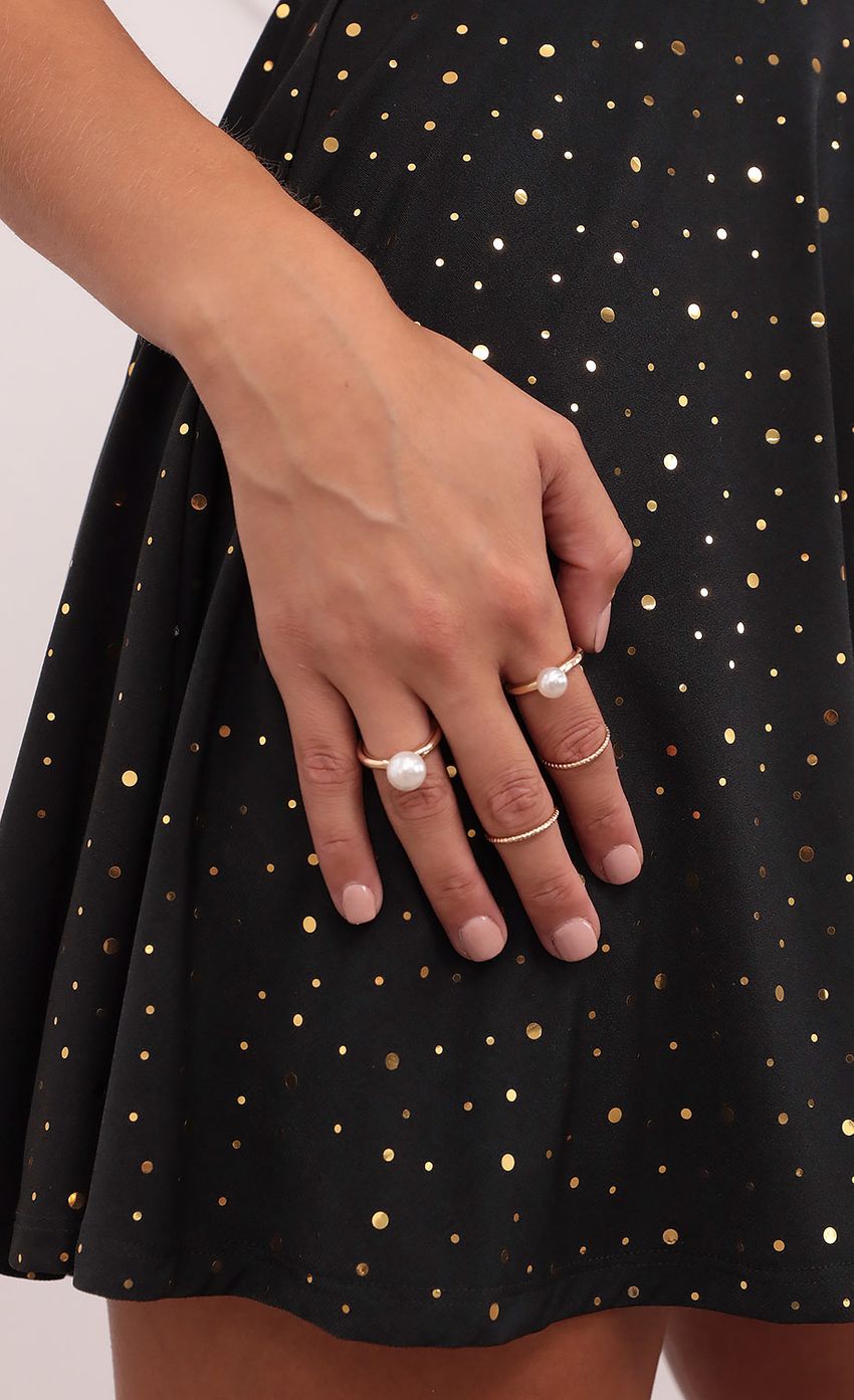 Picture Catch Me If You Can Pearl Rings in Gold. Source: https://media-img.lucyinthesky.com/data/Aug21_2/850xAUTO/1V9A0852.JPG