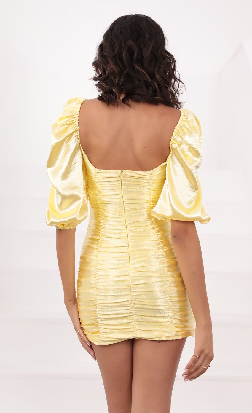 Picture Satin Dress in Yellow. Source: https://media-img.lucyinthesky.com/data/Aug21_2/850xAUTO/1V9A1056.JPG