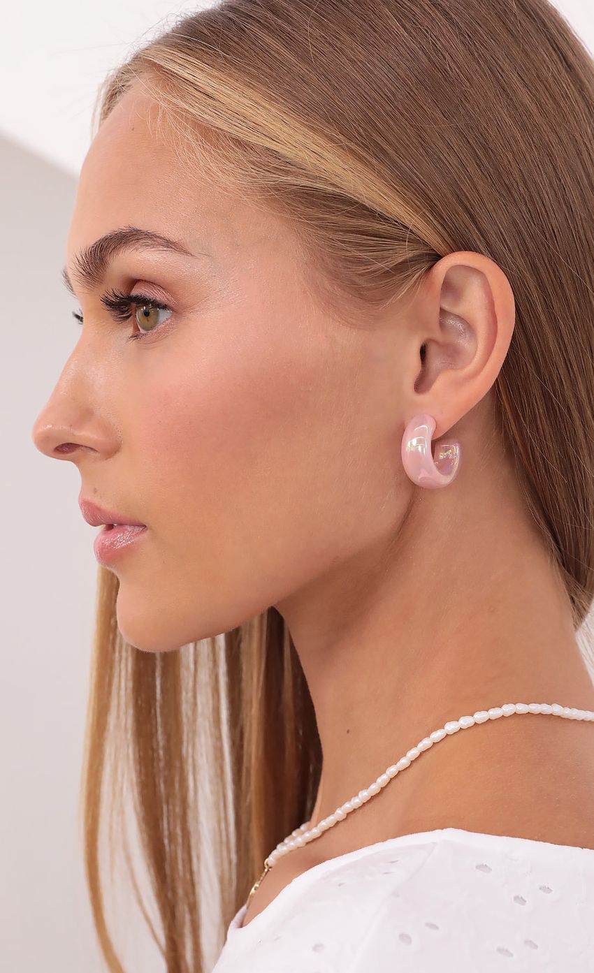 Picture Sweet Like Candy Pink Iridescent Hoops. Source: https://media-img.lucyinthesky.com/data/Aug21_2/850xAUTO/1V9A2795.JPG
