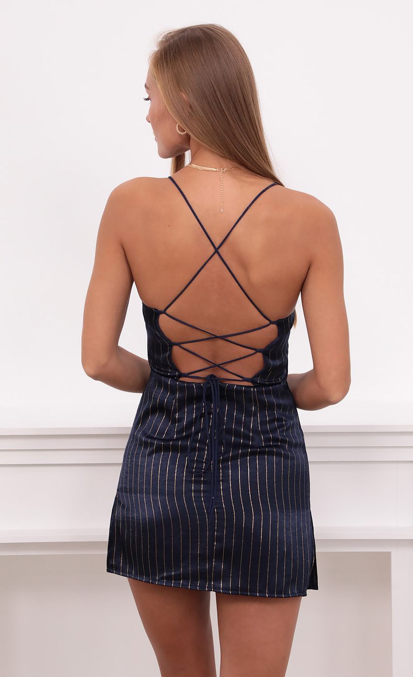 Picture Slip Dress in Navy and Gold Stripes. Source: https://media-img.lucyinthesky.com/data/Aug21_2/850xAUTO/1V9A4755.JPG