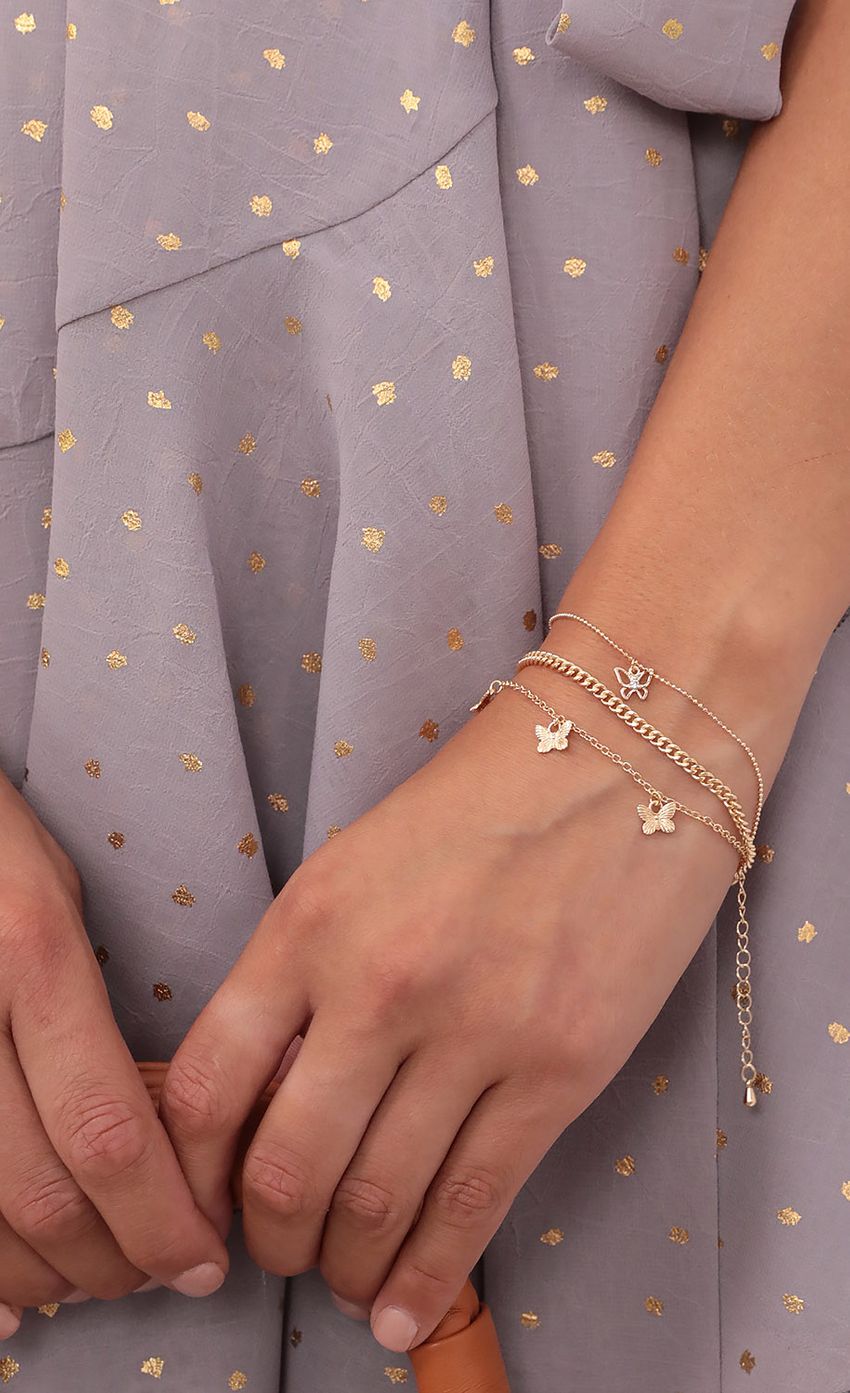 Picture Mixed Wings Bracelet Set in Gold. Source: https://media-img.lucyinthesky.com/data/Aug21_2/850xAUTO/1V9A5329.JPG