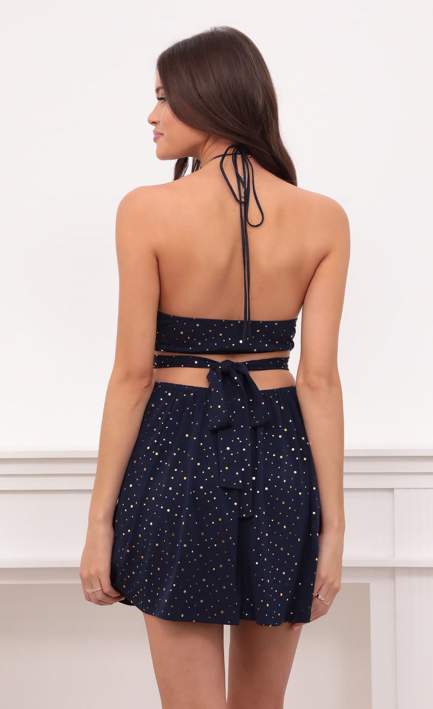 Picture Shimmer Halter Cutout Dress in Navy. Source: https://media-img.lucyinthesky.com/data/Aug21_2/850xAUTO/1V9A5745.JPG