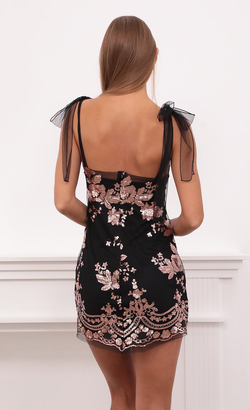 Picture Sequin Mini Dress in Black and Rose Gold. Source: https://media-img.lucyinthesky.com/data/Aug21_2/850xAUTO/1V9A7391.JPG