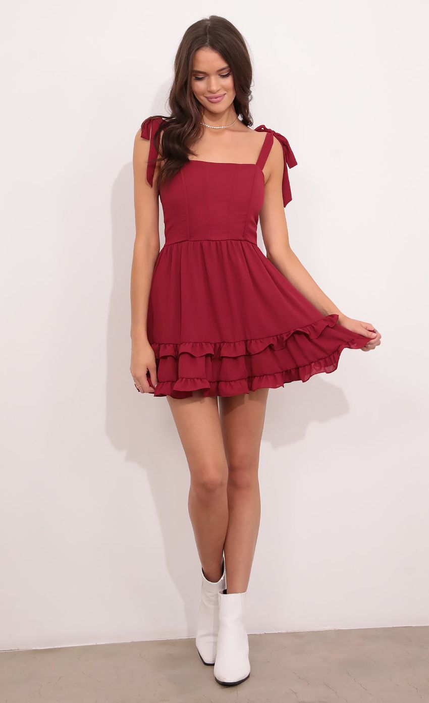 Picture Netty Corset Dress in Burgundy. Source: https://media-img.lucyinthesky.com/data/Aug21_2/850xAUTO/1V9A8451.JPG