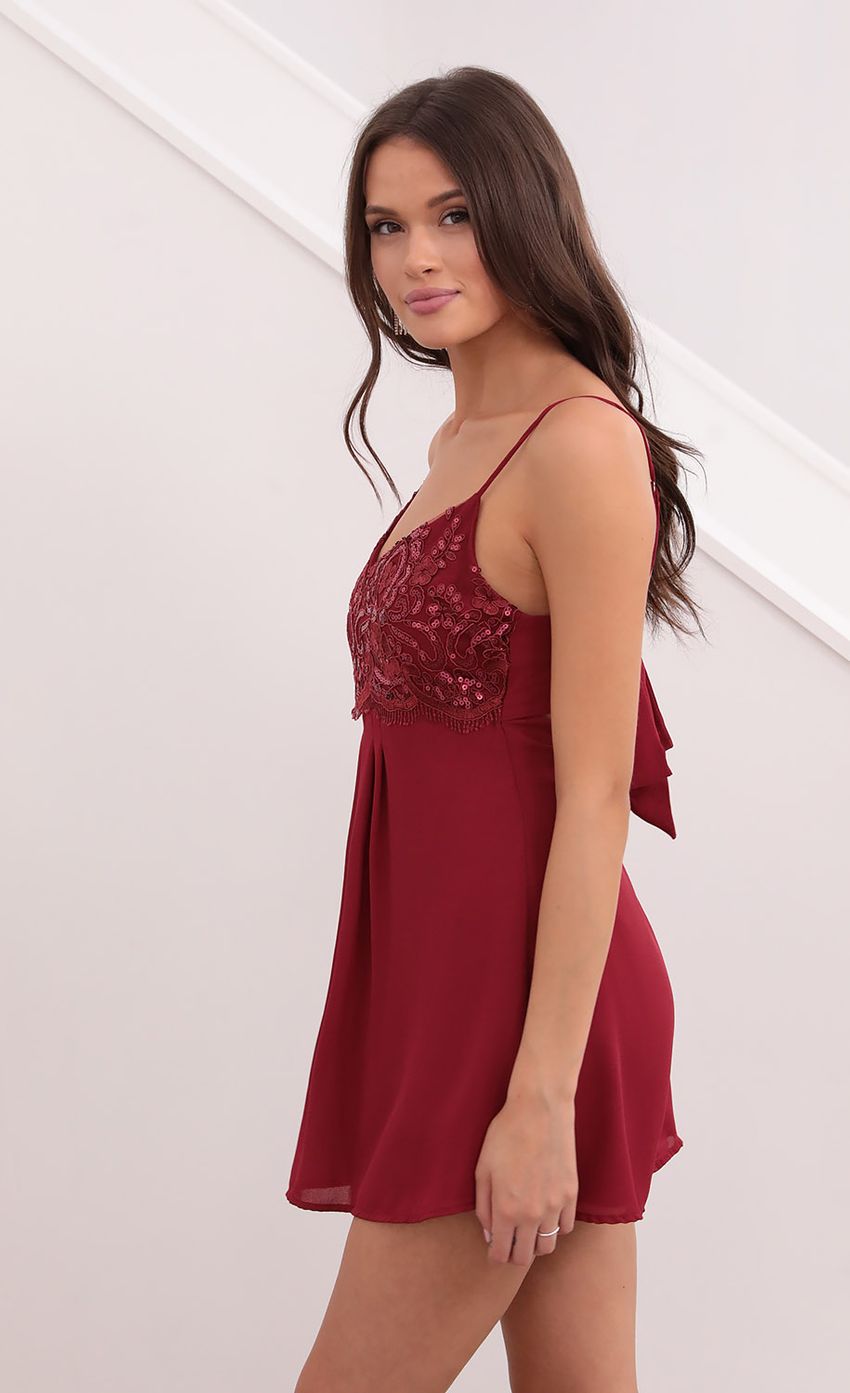 Picture Dress in Burgandy. Source: https://media-img.lucyinthesky.com/data/Aug21_2/850xAUTO/1V9A9753_2.JPG
