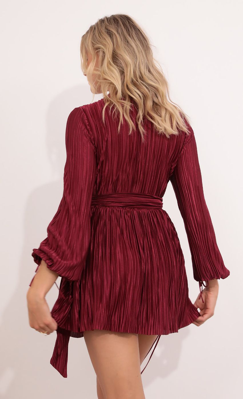 Picture Wrap Around Dress in Burgundy. Source: https://media-img.lucyinthesky.com/data/Aug21_2/850xAUTO/1V9A9761.JPG