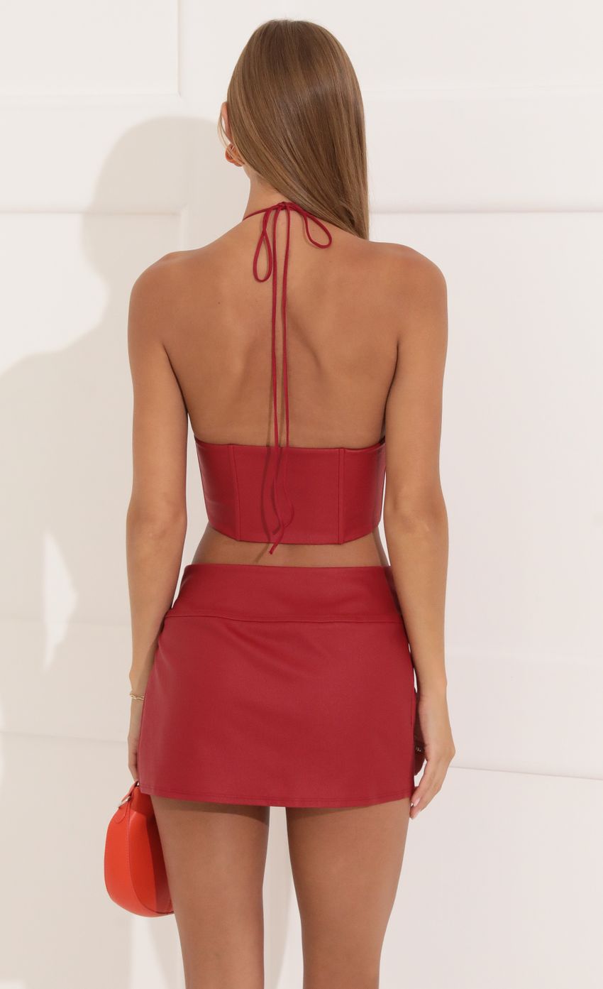 Picture Faux Leather Two Piece Skirt Set in Red. Source: https://media-img.lucyinthesky.com/data/Aug22/850xAUTO/34dfed39-fa88-4a6a-8e3e-49e48afd4e7f.jpg