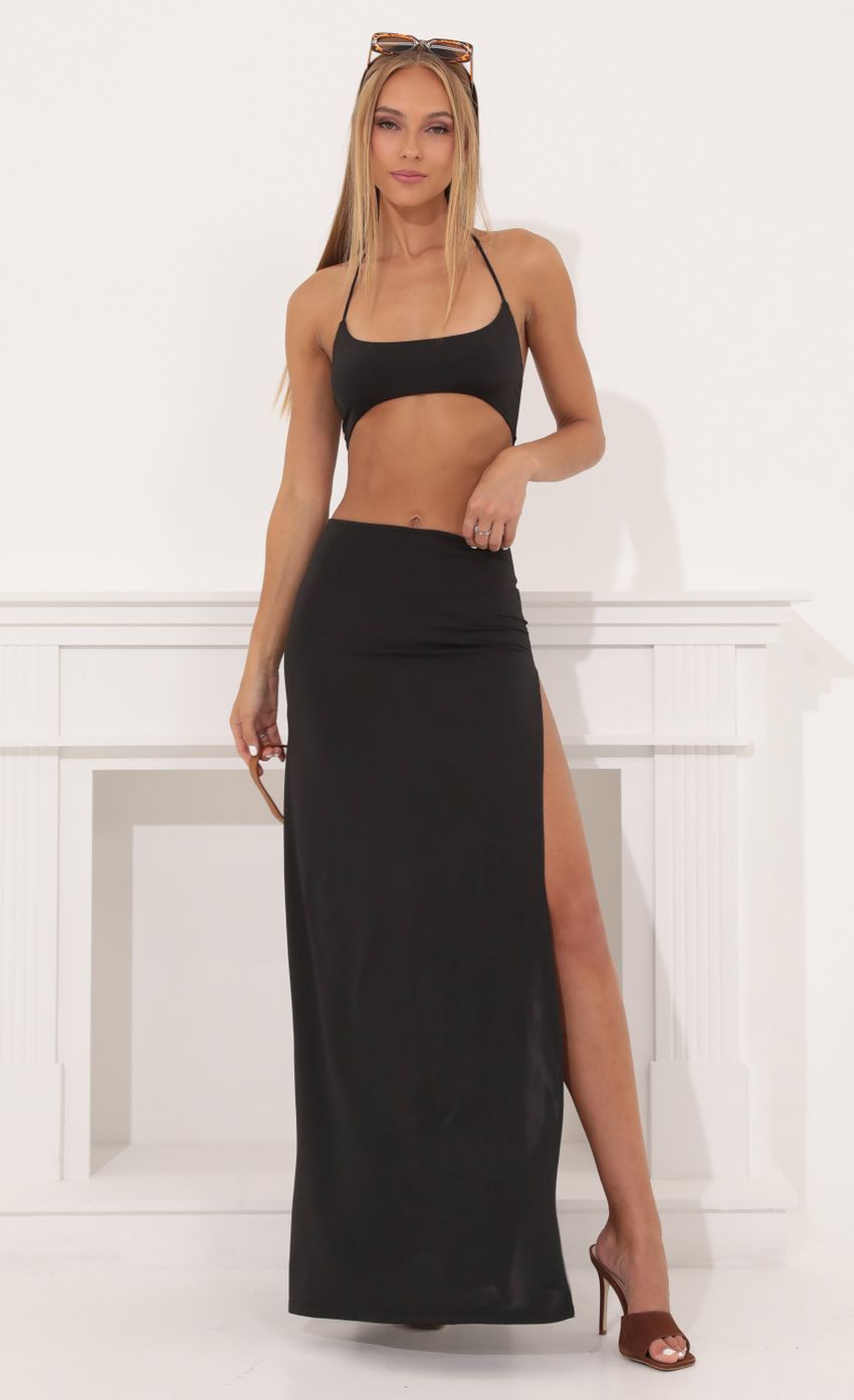 Picture Tummy Cutout Maxi Dress in Black. Source: https://media-img.lucyinthesky.com/data/Aug22/850xAUTO/59ea12c6-04fc-406e-975c-17d1dfb3d9d0.jpg