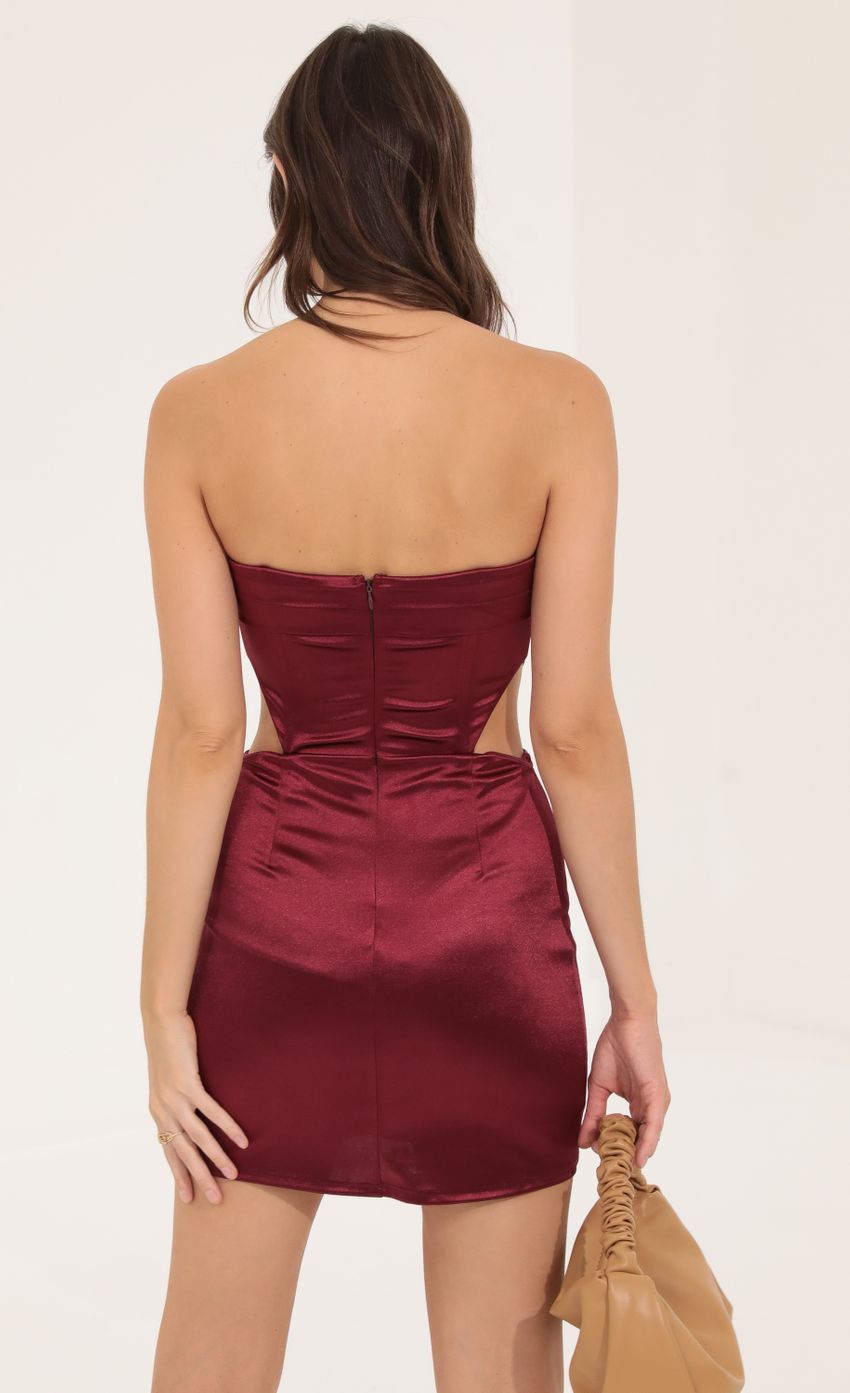 Picture Satin Corset Cutout Dress in Red. Source: https://media-img.lucyinthesky.com/data/Aug22/850xAUTO/99b2a973-01b2-4caa-bc2d-bb6b1cc9493f.jpg