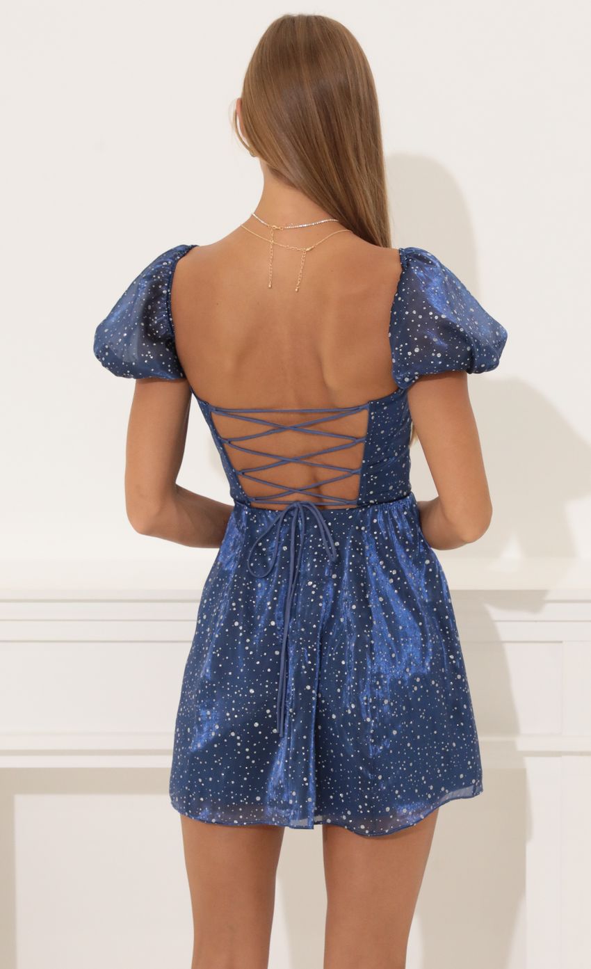 Picture Glitter Puff Sleeve Dress in Blue. Source: https://media-img.lucyinthesky.com/data/Aug22/850xAUTO/af223894-2f6d-4a37-a8f7-964388cf3053.jpg