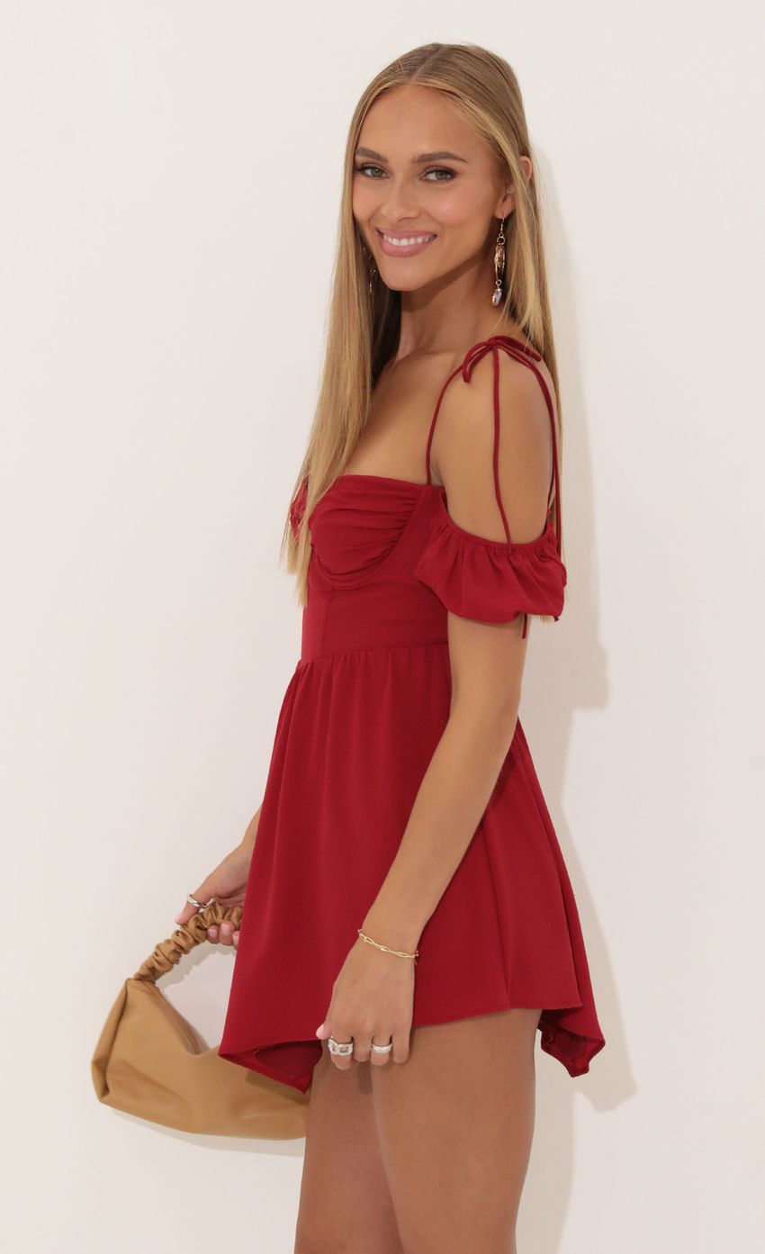 Picture Crepe Corset Dress in Red. Source: https://media-img.lucyinthesky.com/data/Aug22/850xAUTO/f45c8f09-7d8a-4221-8b7e-4d3669e2d212.jpg
