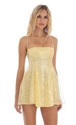 Picture Sequin Flare Dress in Yellow. Source: https://media-img.lucyinthesky.com/data/Aug23/150xAUTO/8eec2856-3bf3-4221-aa30-f624585269a8.jpg