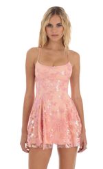 Picture Floral Sequin Dress in Peach. Source: https://media-img.lucyinthesky.com/data/Aug23/150xAUTO/a0f0272d-719f-48b0-8a90-1f51c09acd09.jpg