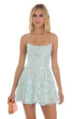 Picture Sequin Mesh Floral Dress in Blue. Source: https://media-img.lucyinthesky.com/data/Aug23/150xAUTO/c23d445f-b668-42d9-88ce-b5fd2d714ee2.jpg