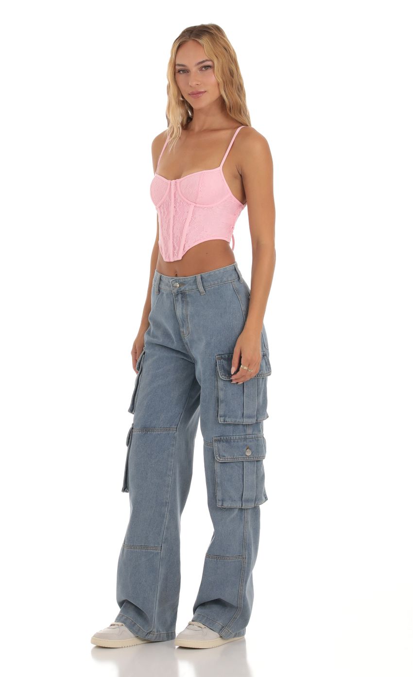 Picture Lace Corset Top in Pink. Source: https://media-img.lucyinthesky.com/data/Aug23/850xAUTO/09cfbdc0-3fd7-4d4b-b676-51b30c6052c1.jpg