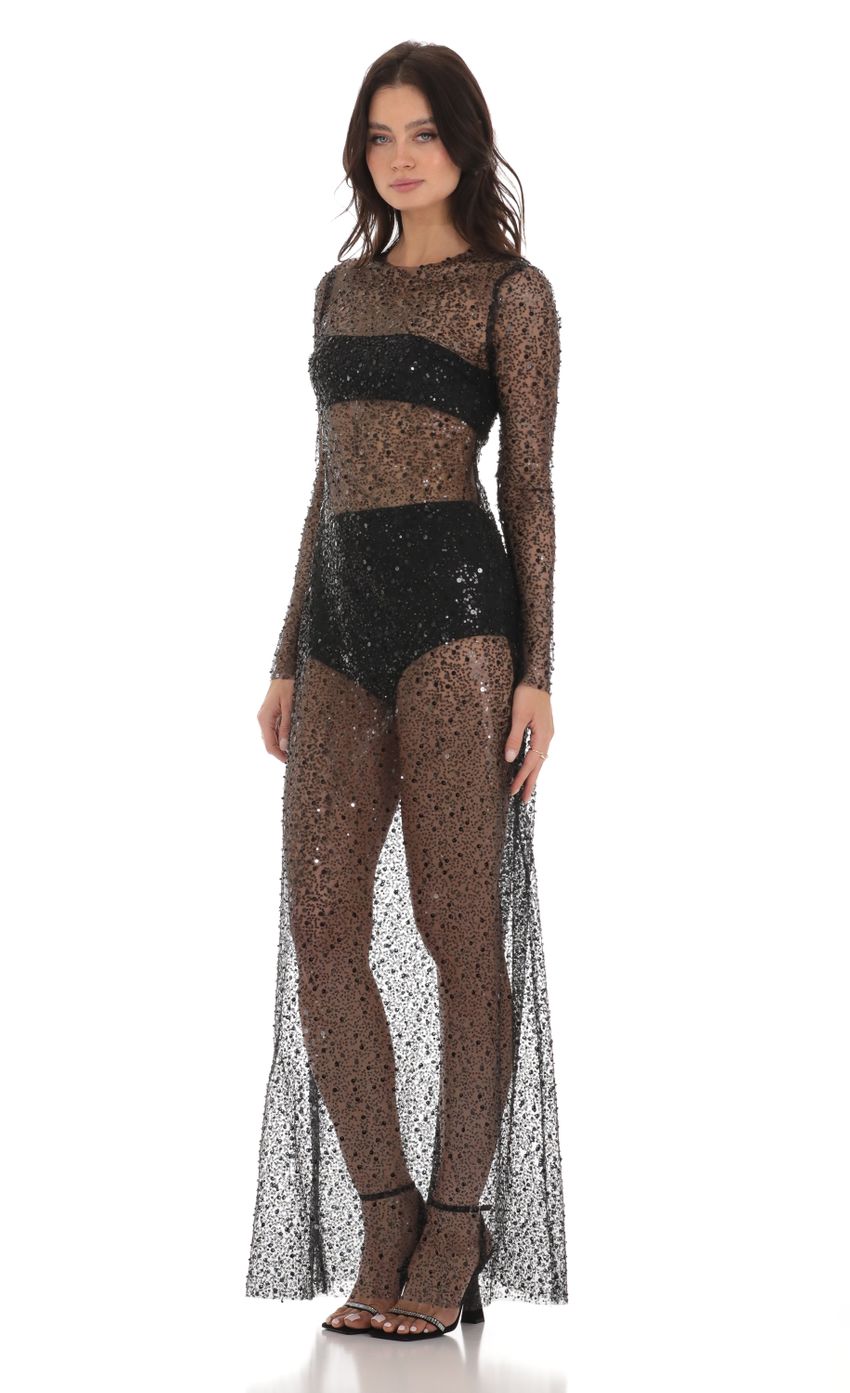 Picture Sequin Mesh Dress in Black. Source: https://media-img.lucyinthesky.com/data/Aug23/850xAUTO/14f85400-83eb-4a70-a07e-bfd77b3c5ee5.jpg