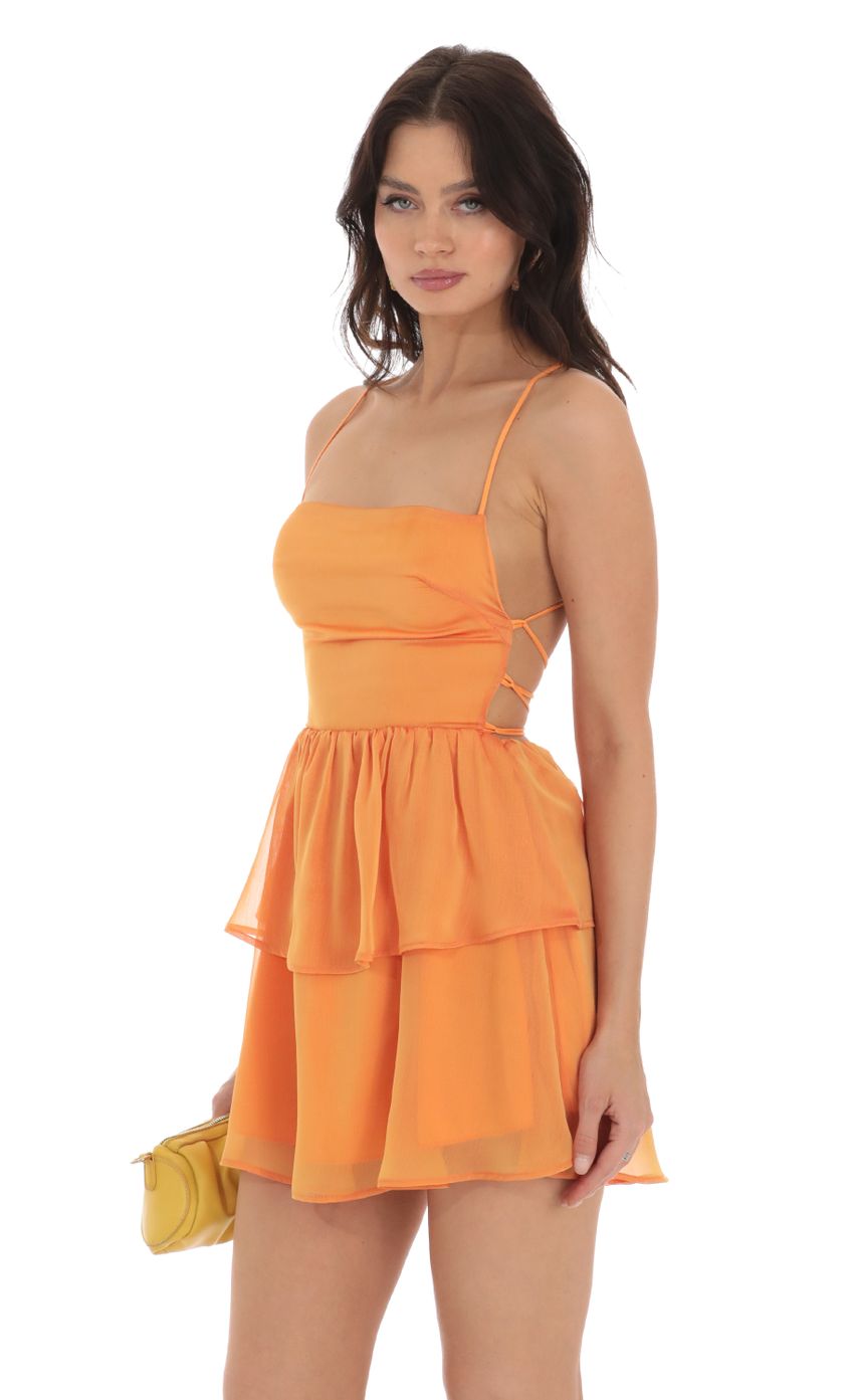 Picture Chiffon Lace Up Dress in Orange. Source: https://media-img.lucyinthesky.com/data/Aug23/850xAUTO/292f813c-774e-4324-ac56-29e54ef4f203.jpg