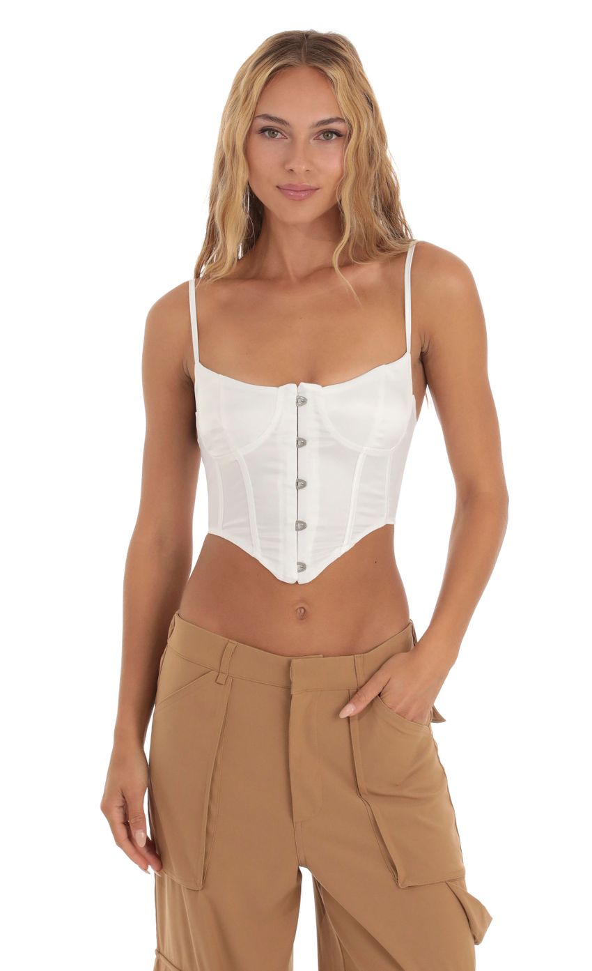 Picture Satin Corset Top in White. Source: https://media-img.lucyinthesky.com/data/Aug23/850xAUTO/339b9b35-2ab6-480e-908b-8d4c50dc2265.jpg