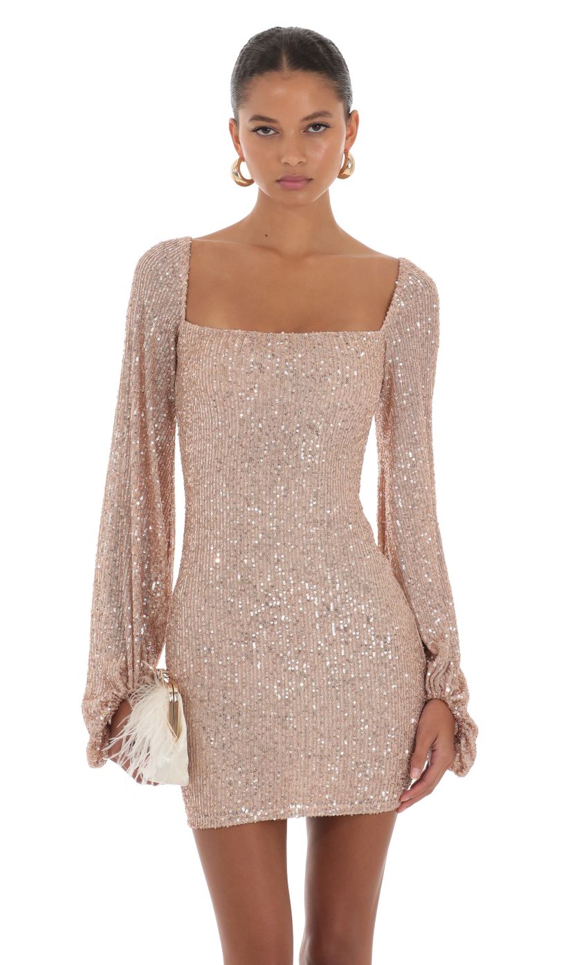 Picture Sequin Long Sleeve Dress in Rose Gold. Source: https://media-img.lucyinthesky.com/data/Aug23/850xAUTO/5556c462-2ce6-4497-b9c6-7381cd815dba.jpg