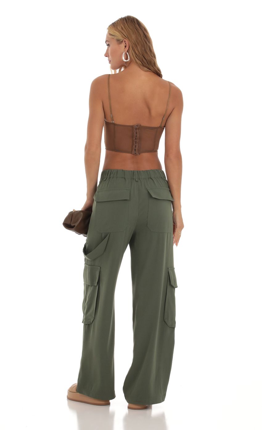 Picture Cargo Pants in Green. Source: https://media-img.lucyinthesky.com/data/Aug23/850xAUTO/7b5ad773-85ce-4ae4-850a-a1b94fb48e65.jpg