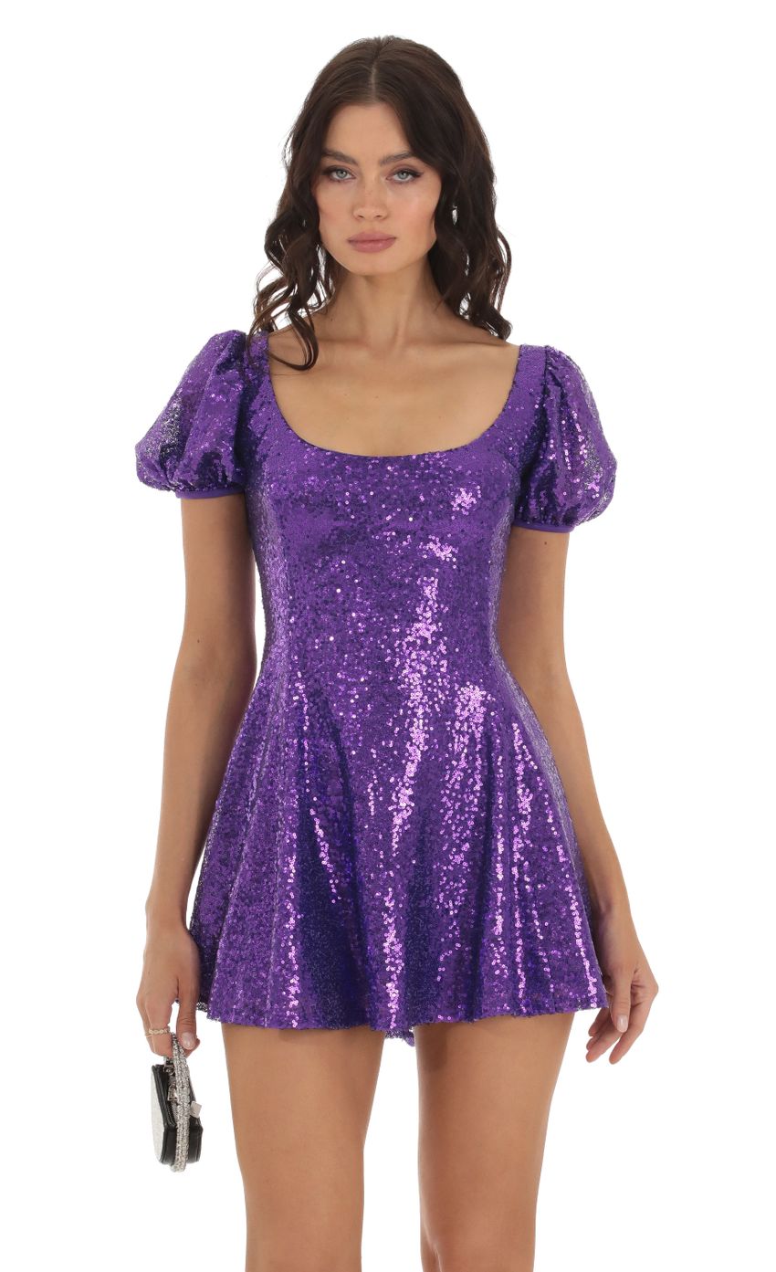 Picture Sequin Puff Sleeve Dress in Purple. Source: https://media-img.lucyinthesky.com/data/Aug23/850xAUTO/8400feee-c5ce-494b-a9cb-8646550958ab.jpg