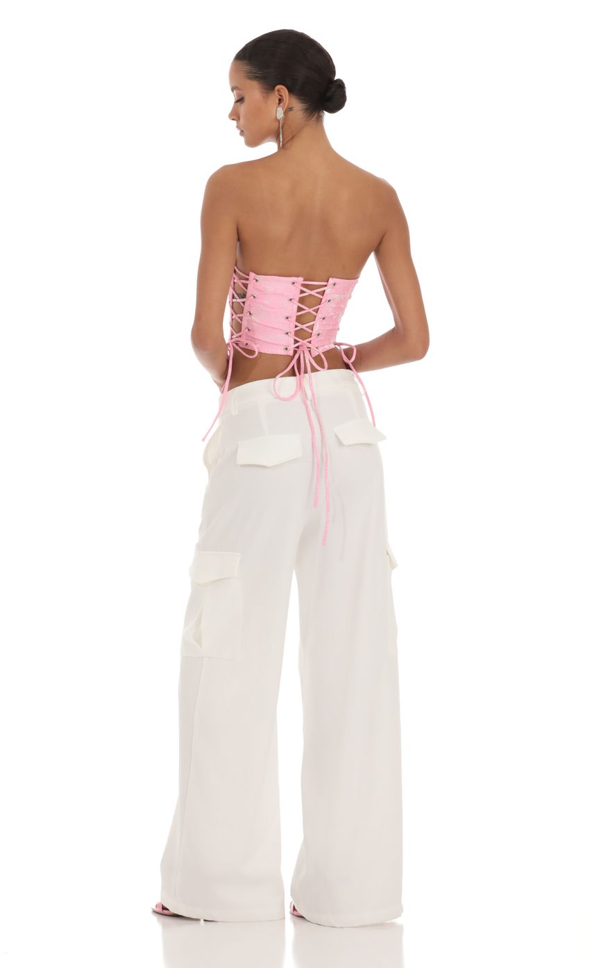 Picture Embroidered Corset Top in Pink. Source: https://media-img.lucyinthesky.com/data/Aug23/850xAUTO/b6983e13-5d82-43b1-b3e5-43d079a5baf7.jpg