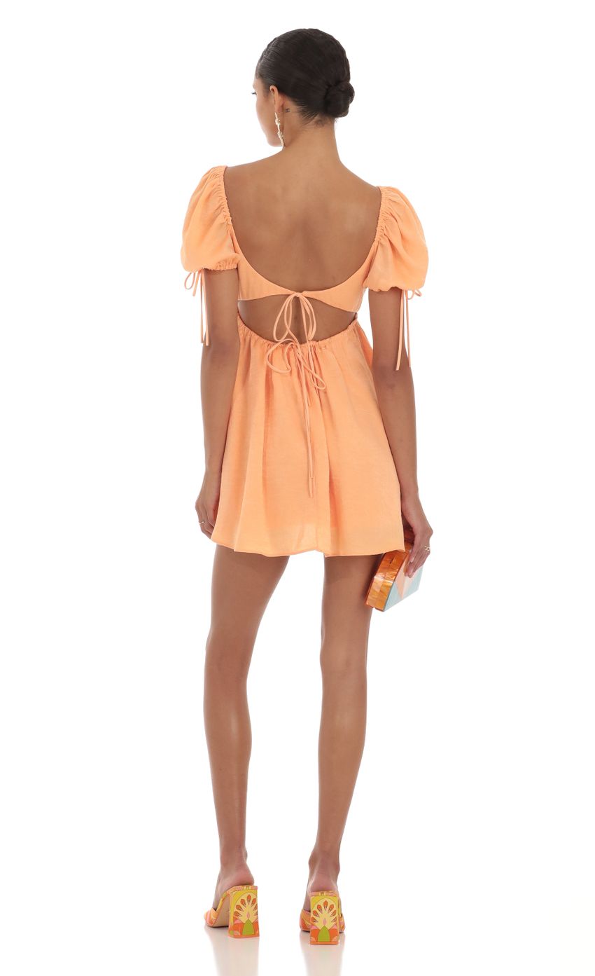 Picture Baby Doll Dress in Orange. Source: https://media-img.lucyinthesky.com/data/Aug23/850xAUTO/c077a90c-9fdc-4ab8-af3e-a889301c3d62.jpg