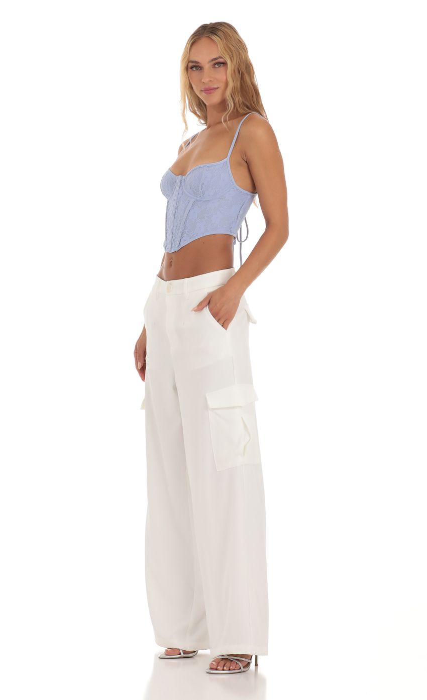 Picture Wide Leg Cargo Pants in White. Source: https://media-img.lucyinthesky.com/data/Aug23/850xAUTO/ca13a6a1-40ec-4a78-8ae2-5d14fd7d3d93.jpg