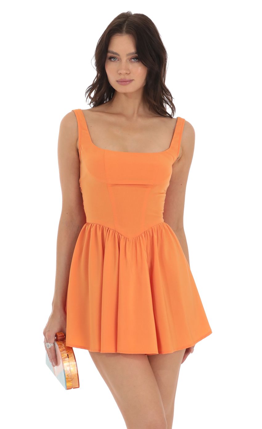 Picture Mini Dress in Orange. Source: https://media-img.lucyinthesky.com/data/Aug23/850xAUTO/d43021bf-2efb-44ab-b4e3-24bf06a6eb96.jpg