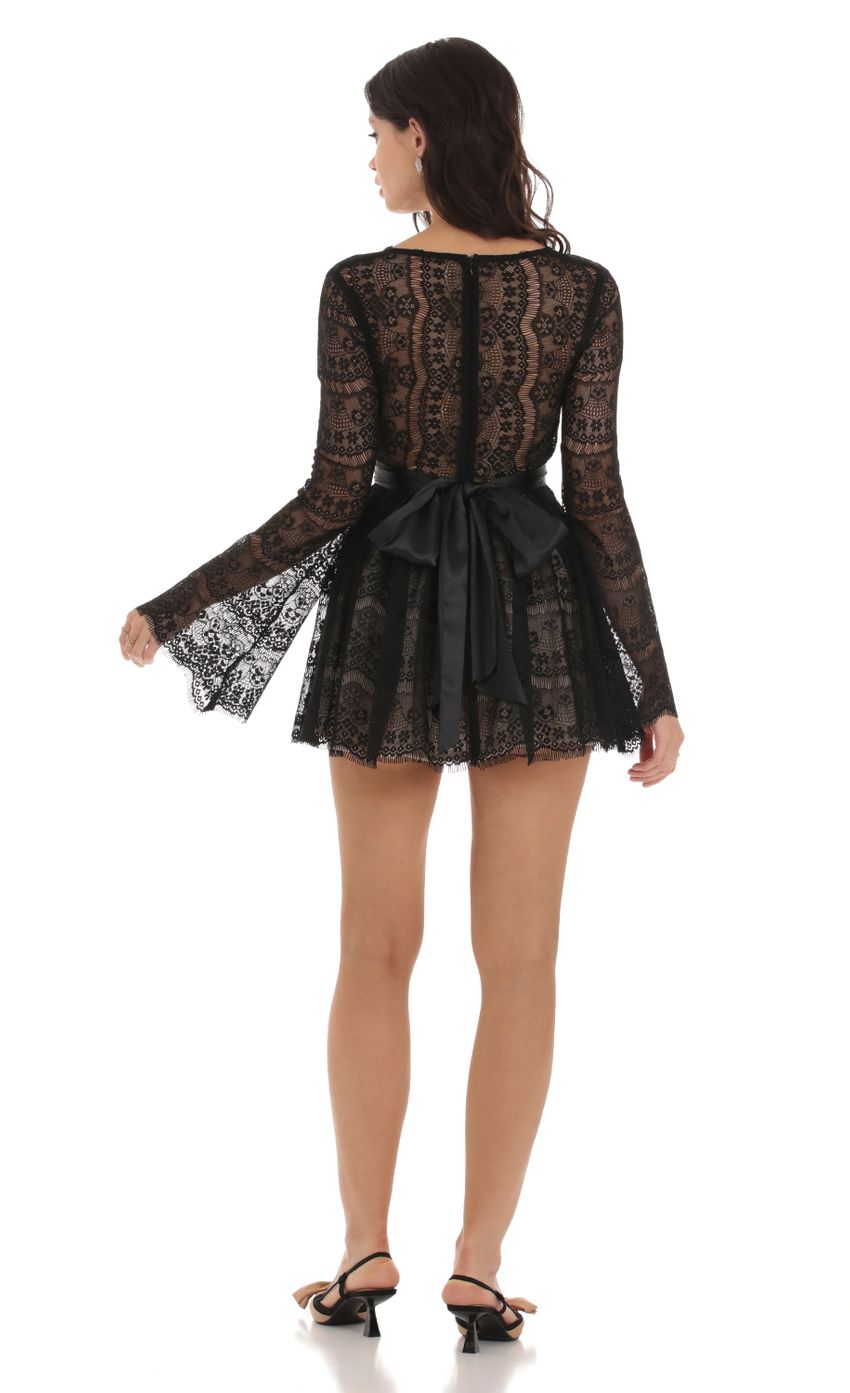 Picture Lace Plunge Neck Dress in Black. Source: https://media-img.lucyinthesky.com/data/Aug23/850xAUTO/d9428f8b-f0a5-4265-9960-4767f5c1092c.jpg