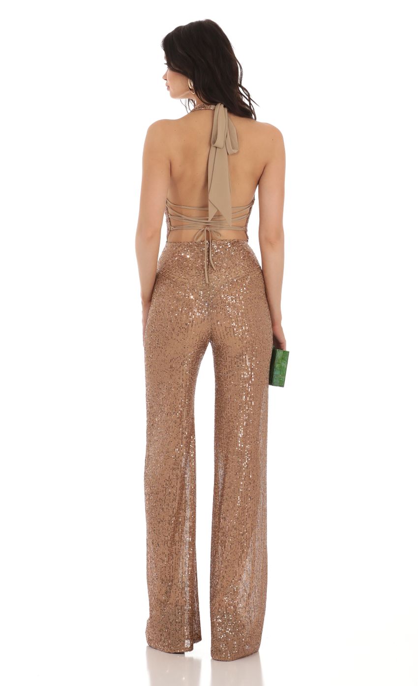 Picture Sequin Jumpsuit in Brown. Source: https://media-img.lucyinthesky.com/data/Aug23/850xAUTO/e5fe20ac-0d81-4570-b9e6-612369127500.jpg