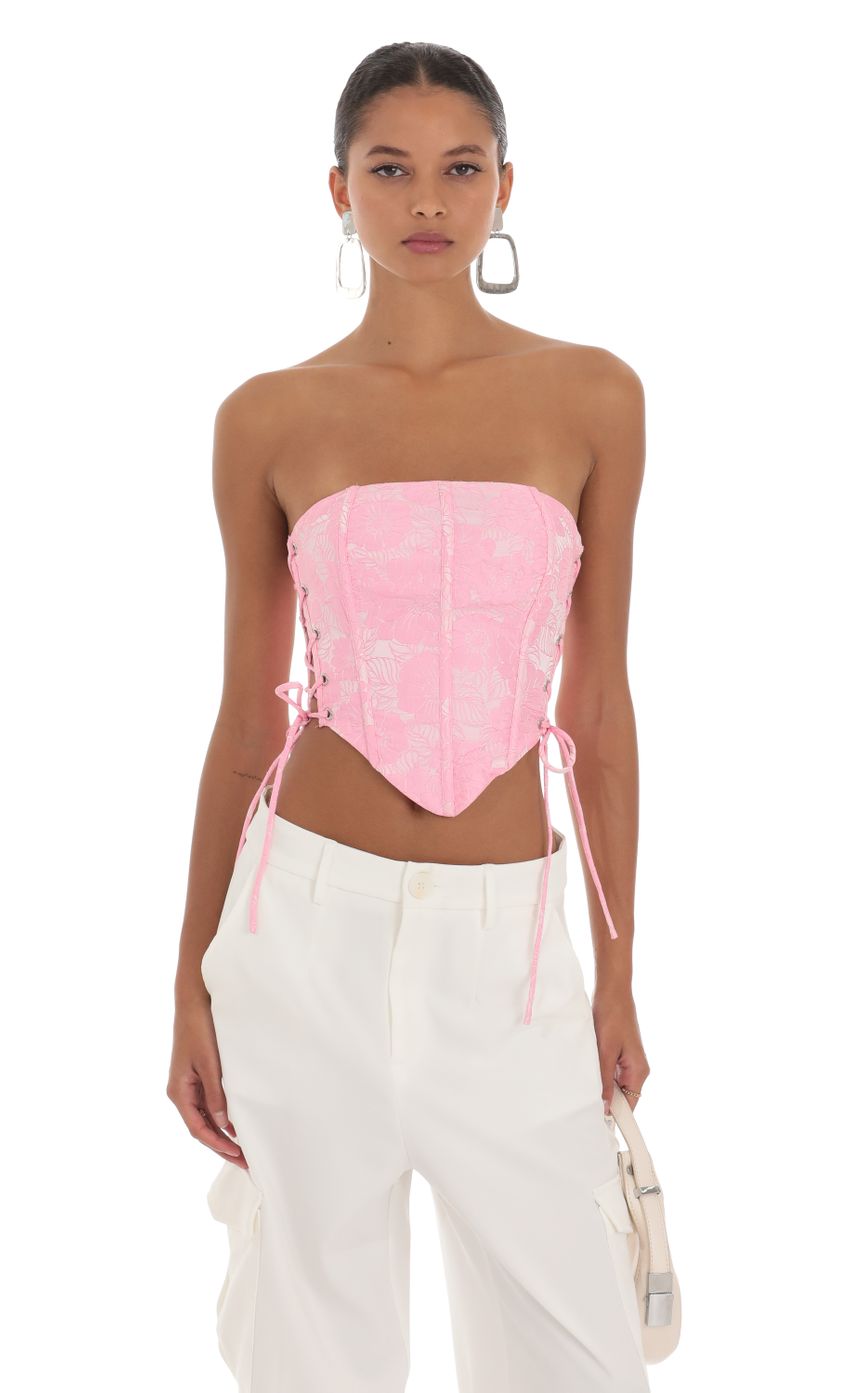 Picture Embroidered Corset Top in Pink. Source: https://media-img.lucyinthesky.com/data/Aug23/850xAUTO/e7674caf-d240-4056-8bc2-15fbc8315917.jpg