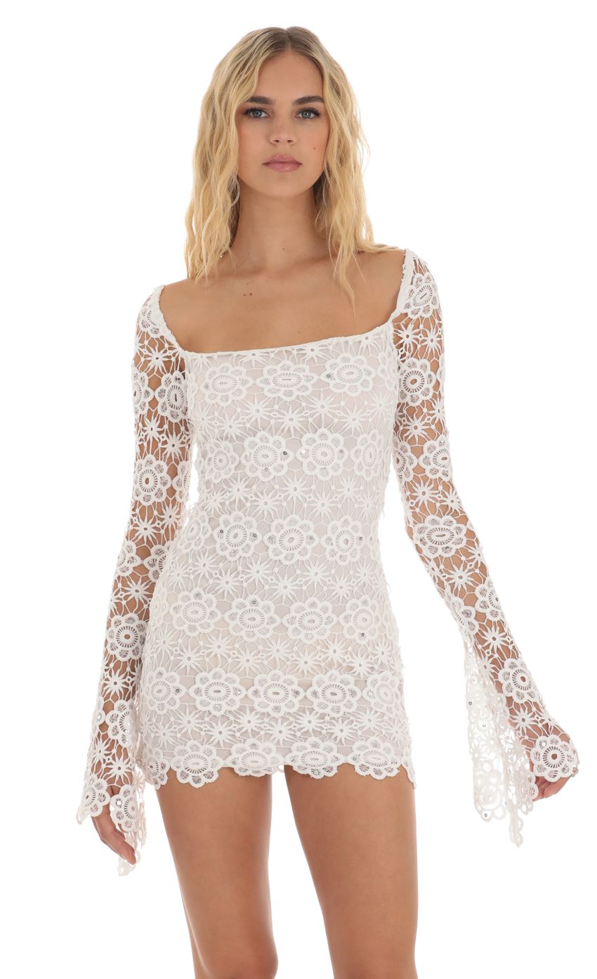 Picture Embroidered Sequin Lace Long Sleeve Dress in White. Source: https://media-img.lucyinthesky.com/data/Aug23/850xAUTO/ec2bf7de-b909-485c-8e9b-be599e3cc305.jpg