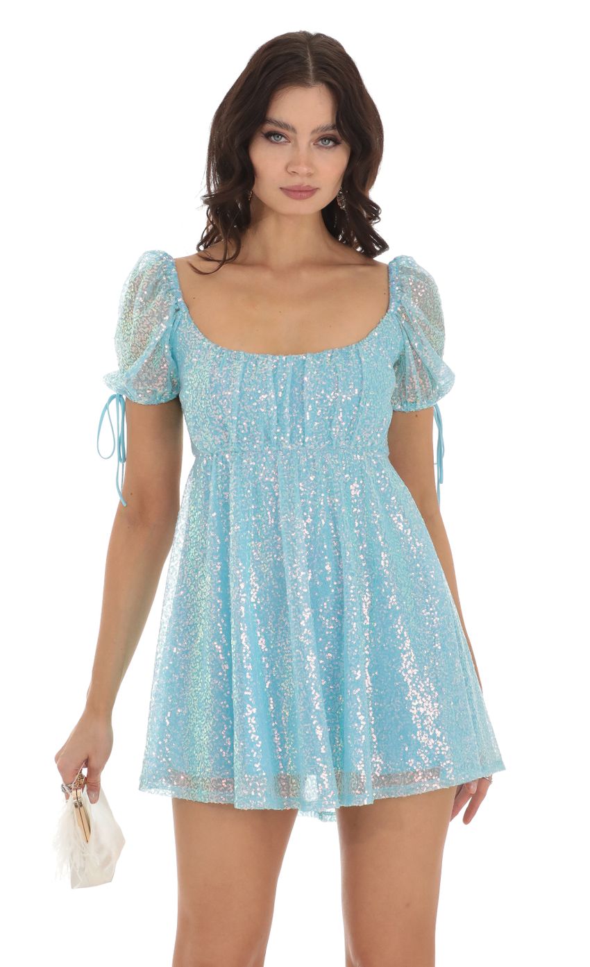 Picture Sequin Baby Doll Dress in Blue. Source: https://media-img.lucyinthesky.com/data/Aug23/850xAUTO/ee0b779b-a73d-4fa9-9ad8-1d8161f11b72.jpg