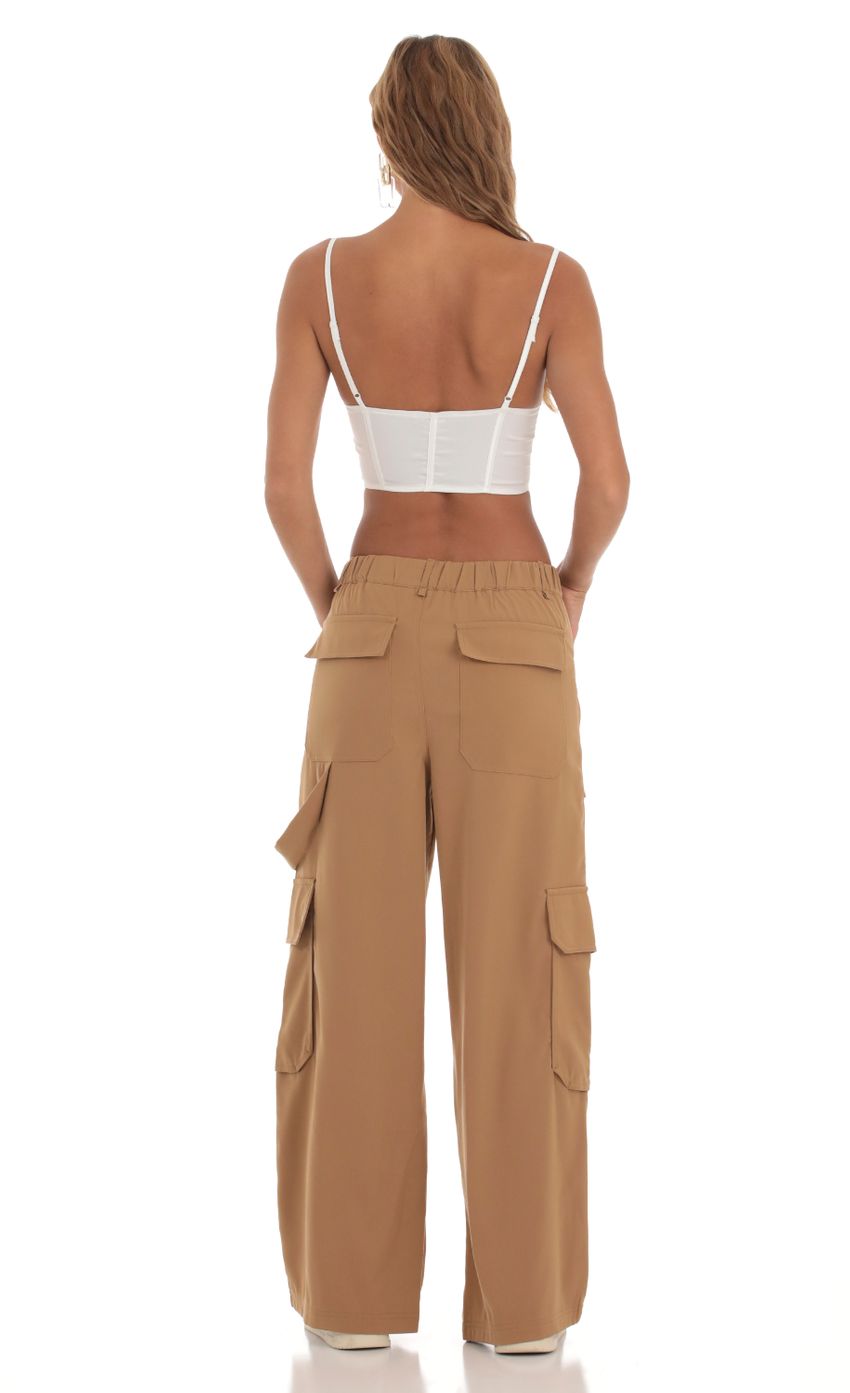 Picture Cargo Pants in Light Brown. Source: https://media-img.lucyinthesky.com/data/Aug23/850xAUTO/f1326018-a512-48f2-b419-f8fc432f79f0.jpg