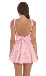 Picture Floral Shimmer Mini Dress in Pink. Source: https://media-img.lucyinthesky.com/data/Aug24/150xAUTO/1765c397-7dc5-428e-9756-c6b150e42093.jpg